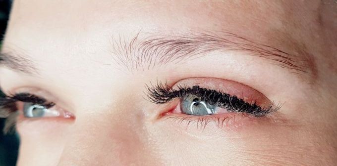 Very pale, barely visible eyebrow before permanent makeup.